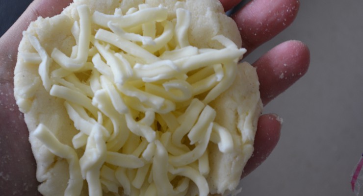 Forming the Arepa with Cheese.