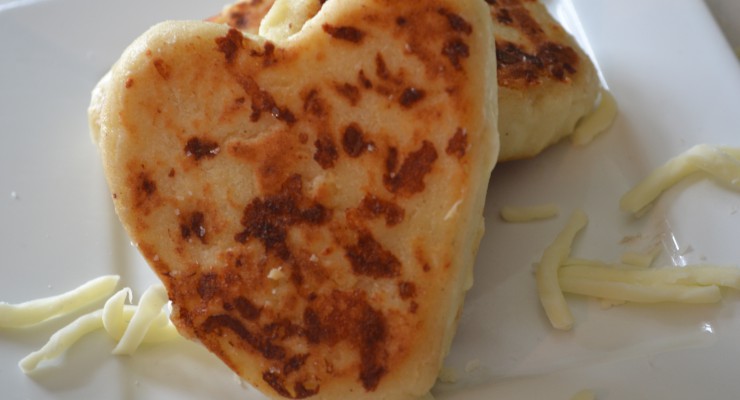 Heart shaped arepa on a plate