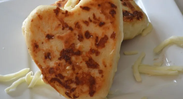 Heart shaped arepa on a plate