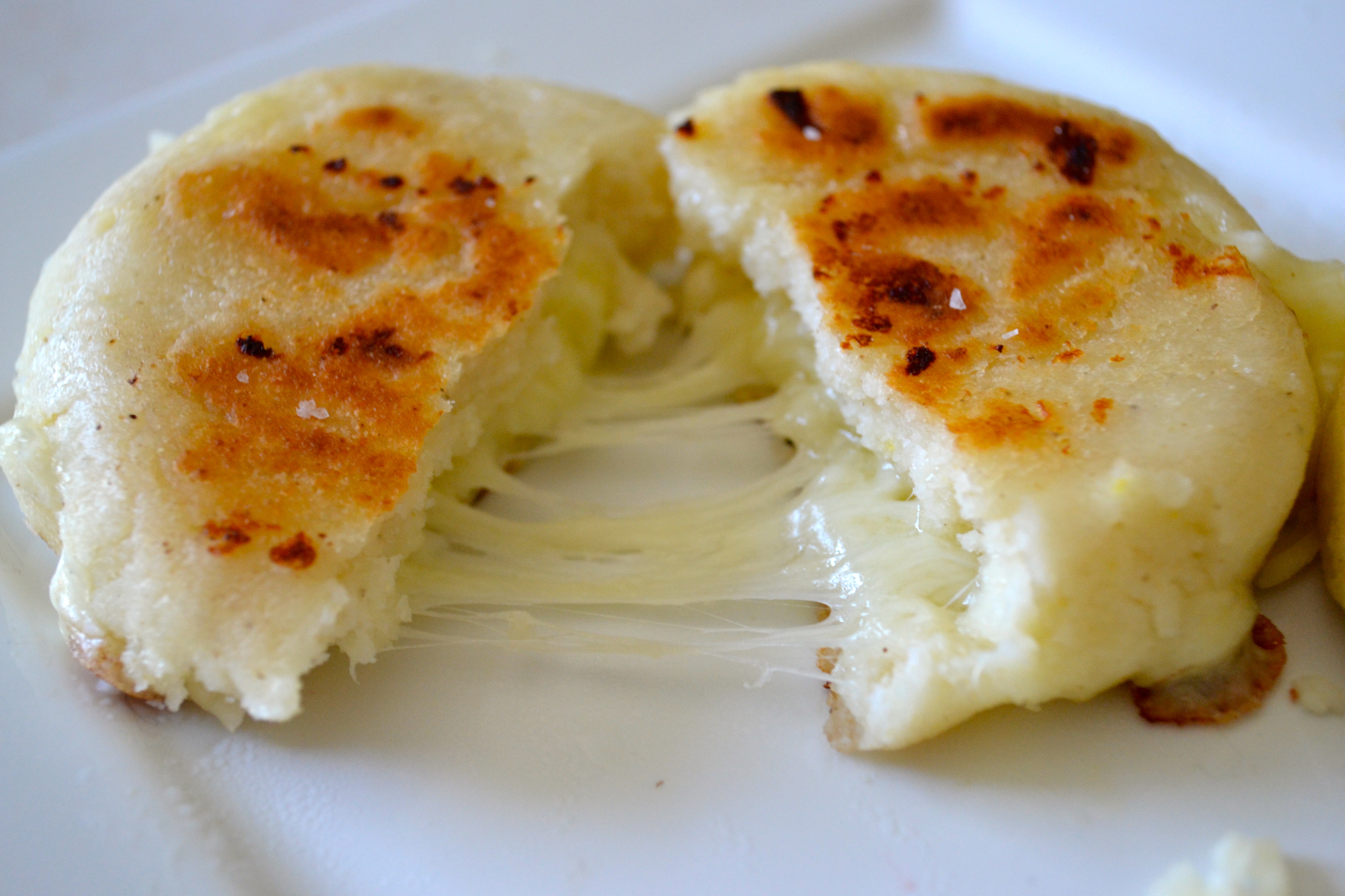 Colombian arepa on the grill - Traditional colombian food Stock